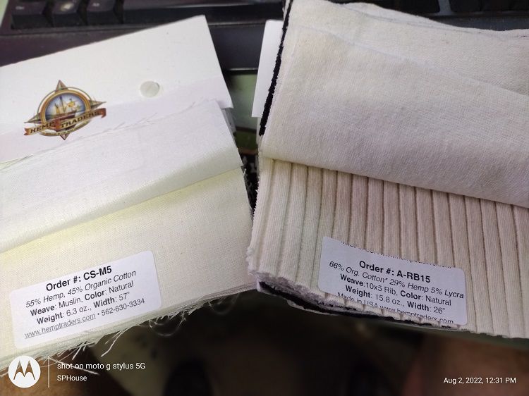 Sample packs of knit pale white yellowish hemp fabric samples.