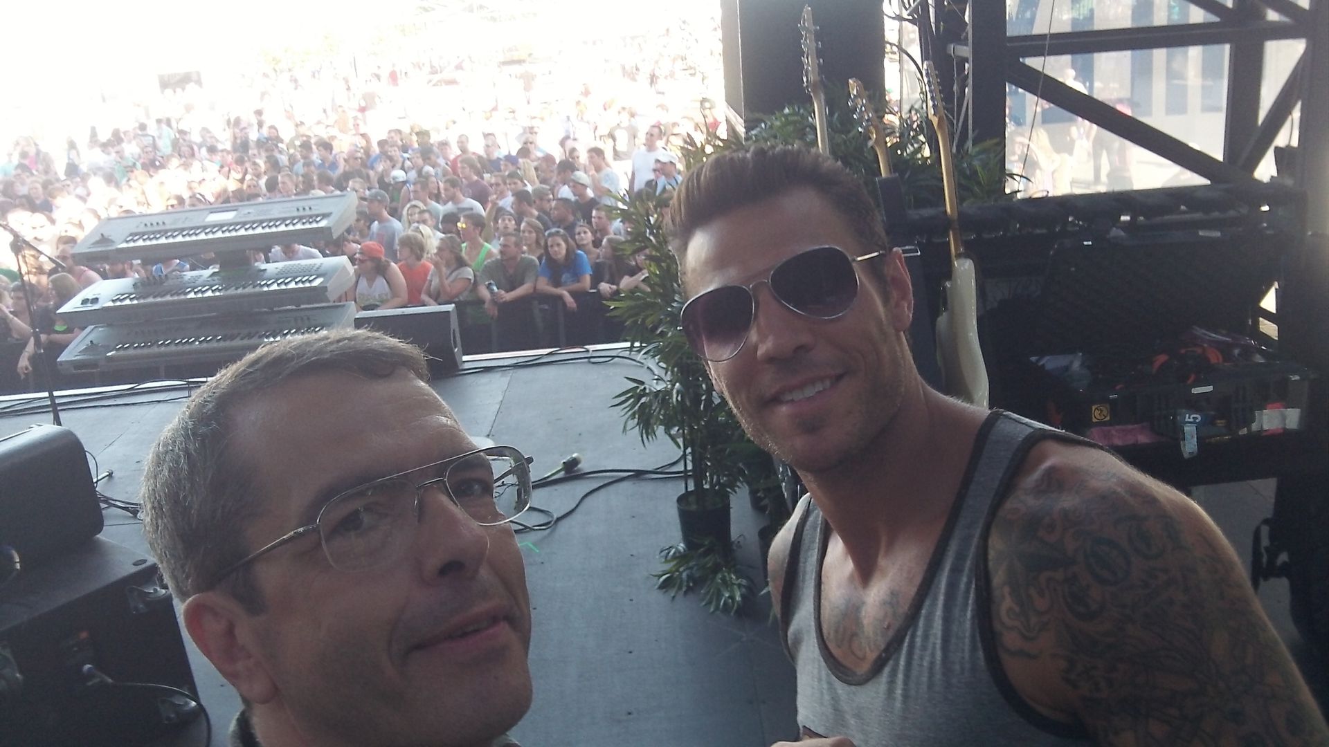 Shawn House on stage with hemp instigator Riles Cote with 1000 of people watching the stage