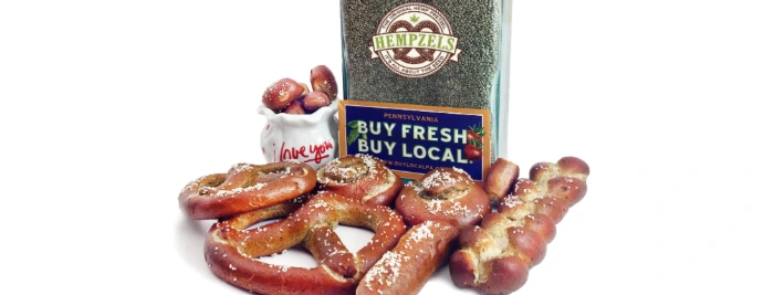 soft pretzels in front of big jar of hemp seed