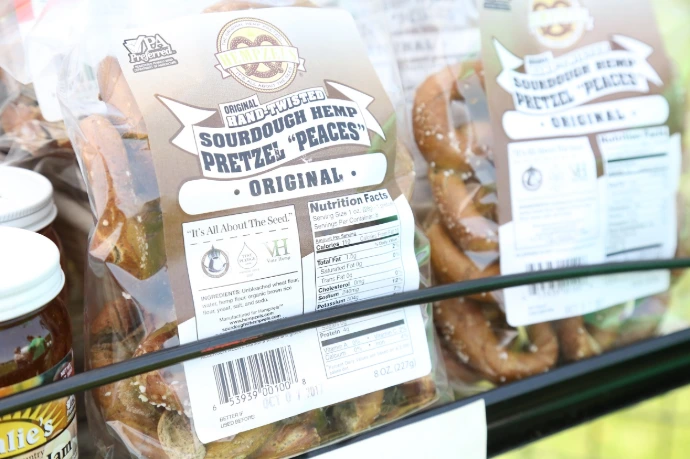 close up image of 2 bags of sourdough pretzels and the label