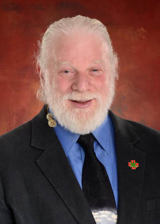 Cannabis Museum Curator Don Wirtshafter in a suit with a great smile